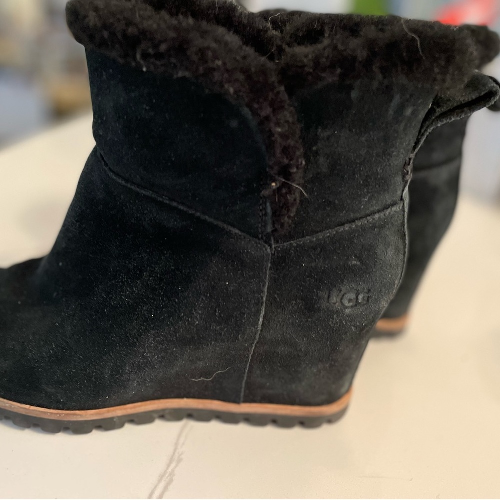 Rarely worn, extremely comfortable UGG 3" hidden wedge booties. Fleece lined 8.5